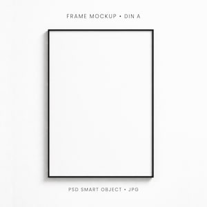 Op de afbeelding: Een zwarte rechthoekige mockup met een witte binnenkant, gecentreerd op een witte achtergrond. De tekst "FRAME MOCKUP • DIN A" staat bovenaan en "PSD SMART OBJECT • JPG" onderaan.