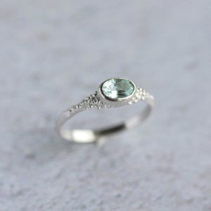 green beryl solitaire ring