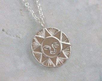 Smiling sun silver necklace