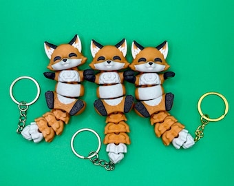 Fox-sleutelhanger Flexi-Friends #3, hand met vrienden, Fidget Fox-sleutelhangers, driekleurige en speciale 3D-regenboogrug