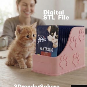 Könnte beinhalten: Ein hellrosa Kunststoff-Organizer für Katzenfutterbeutel mit geprägten Pfotenabdrücken an den Seitenwänden. Der Organizer enthält mehrere dunkelblaue Felix Fantastic Katzenfutterbeutel. Der Text Digital STL File ist zu sehen.