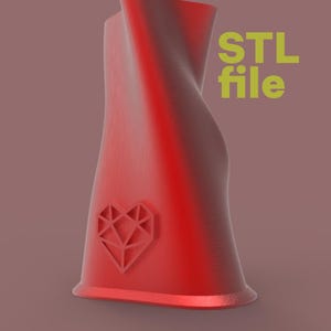 May include: A red, abstract 3D-printed object with a heart-shaped design. The object has a twisted, flowing shape and the text "STL file" in yellow. The design is likely for 3D printing.