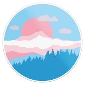 May include: A round sticker featuring a mountain landscape in the colors of the transgender pride flag. The design includes a pink sun, white-topped mountains, pink and white clouds, and a blue forest silhouette against a light blue sky.