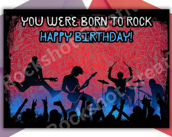 May include: A rectangular birthday card featuring a red background with a black musical note pattern. The text reads YOU WERE BORN TO ROCK and HAPPY BIRTHDAY! Silhouettes of a rock band performing on stage are visible in black and blue.