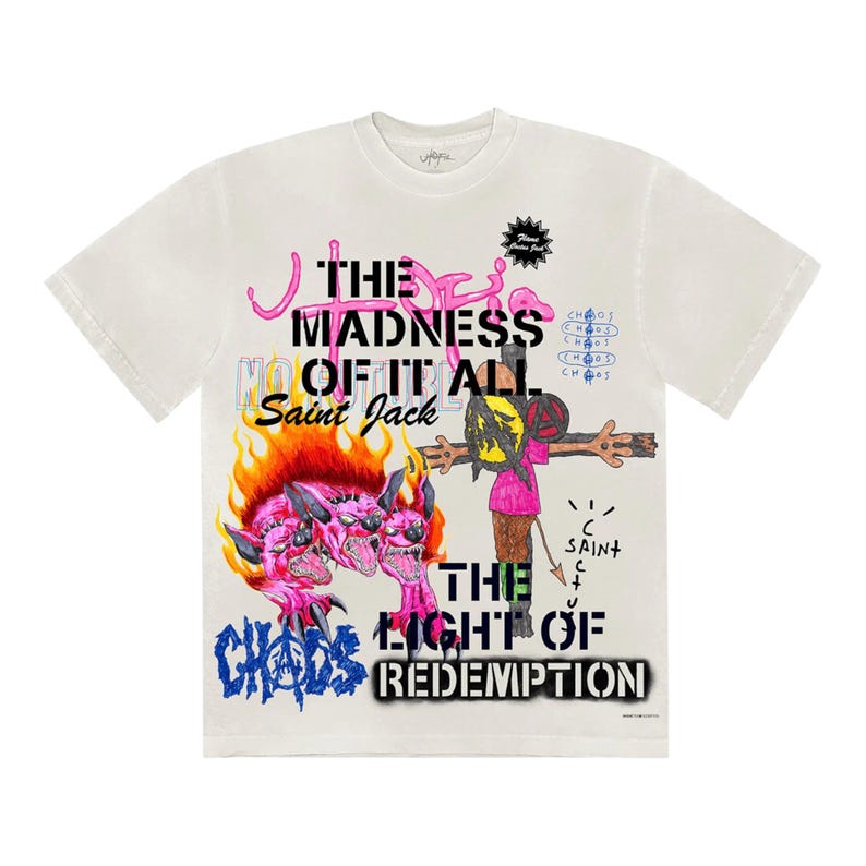 May include: Off-white t-shirt with a graphic design featuring the text "THE MADNESS OF IT ALL Saint Jack" in pink and black. The design includes a three-headed pink monster engulfed in flames, and a figure on a cross. The word "CHAOS" is also visible.