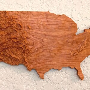 Arte de parede representando o território continental dos EUA - verdadeira escala topográfica 3D