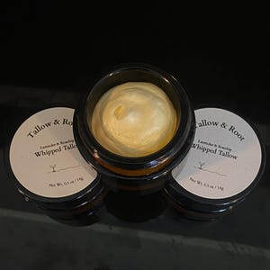 May include: Three small, dark glass jars with white labels and a creamy, whipped product inside. The labels read "Tallow & Root" and "Lavender & Rosehip Whipped Tallow." Each jar contains 0.5 oz / 14g of product.
