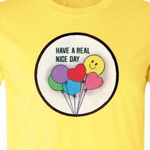 80s Smiley Balloon Retro Jersey Tee | “Have a Real Nice Day” Graphic