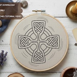 May include: An embroidery hoop with a Celtic cross design in black outlines. The design features intricate knotwork within the cross shape and surrounding circles. Text on the image reads: PDF INSTANT DOWNLOAD, OUTLINES ONLY, BASIC STITCHES TUTORIAL VIDEO.