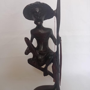 Hand-Carved Mahogany Fisherman Figurine: Vintage Coastal Folk Art