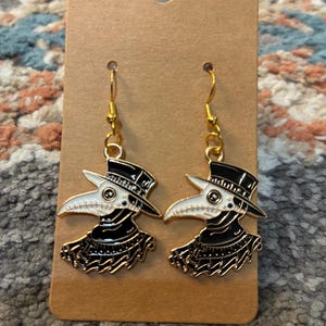 black plague doctor earrings.