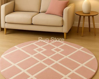 Tapete redondo geométrico rosa blush, feito à mão em lã – Elegância minimalista moderna