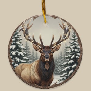 May include: A round Christmas ornament featuring a majestic elk with large antlers adorned with lights. The elk is set against a snowy forest backdrop, framed by a wooden border. A gold ribbon is attached for hanging.