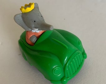Babar el elefante Celeste conduciendo un coche verde de 2" de alto, Arby's 1992