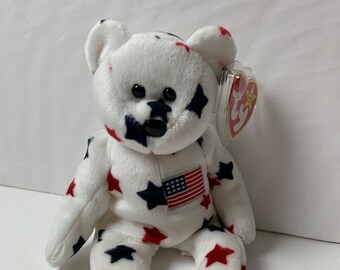 Peluche bébé ours « Glory » Ty Beanie avec drapeau étoiles rouges et bleues avec étiquettes 8,5 po. de haut 1998 Peluche