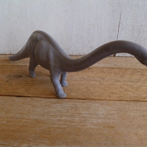 Diplodocus genus of Sauropod Dinosaur British Museum of History 5&quot; Tall X 15&quot; Long 1974