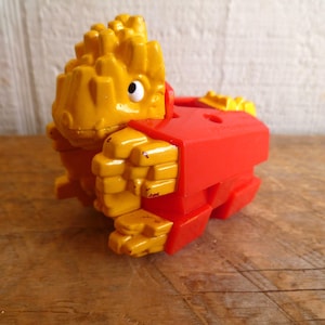 McDonalds French Fries Dinosaur Transformer 2&quot; Tall 1990