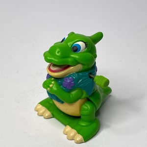 Land Before Time Tumbling Duckie Saurolophus Dinosaur Wind Up Toy Cake Topper 2.25&quot; Tall 1997 Non Working Burger King