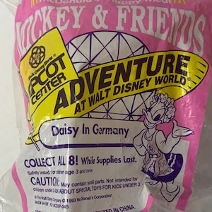 Disney Daisy in Germany Epcot Center New in Package Cake Topper McDonalds 5&quot; Tall 1993