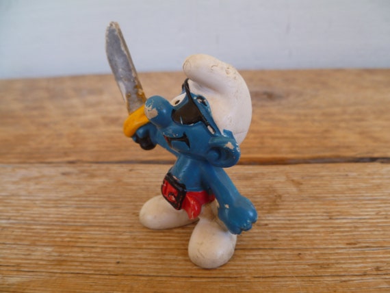 Puffo in miniatura PVC pirata con la spada dell'annata 1978 -  Italia