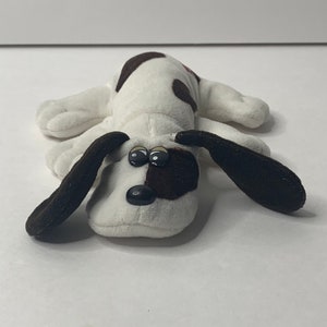 Pound Puppy Newborn Plush White Puppy Brown Spots Floppy Ears Droopy Eyes 8" Long 1980's Television Cartoon Tonka Stuffed Animal Toy