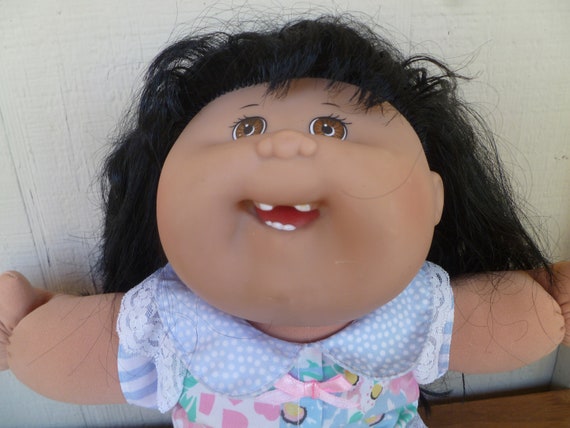 cabbage patch doll with teeth