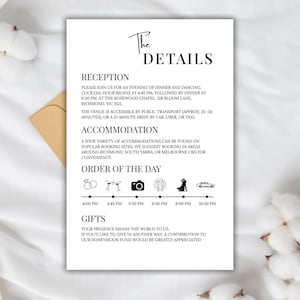 May include: A wedding details card with black text on a white background. The card includes information about the reception, accommodation, order of the day, and gifts. The card is accompanied by a brown envelope and cotton flowers.