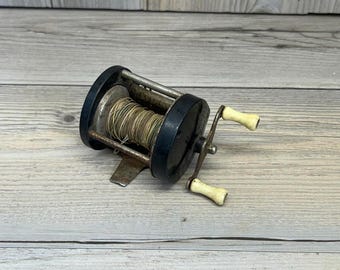 Vintage fiskerulle med dubbla handtag