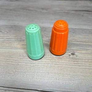 Set of Two Vintage Plastic Salt and Pepper Shakers