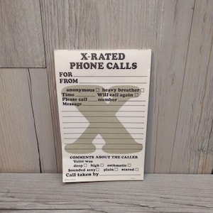 May include: A vintage notepad with the text "X-RATED PHONE CALLS" at the top. The notepad includes sections for caller information and comments about the caller's voice. A large gray "X" is in the center.