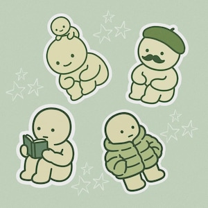 Autocollant en vinyle inspiré d'une boîte aveugle Smiski - Autocollants drôles de petit gars vert avec club de lecture, coussin d'hiver, béret pour bébé