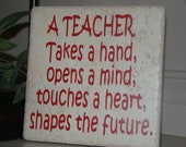 A Teacher Takes a Hand, Opens a mind Teachers Quote on Tile with Vinyl Lettering
