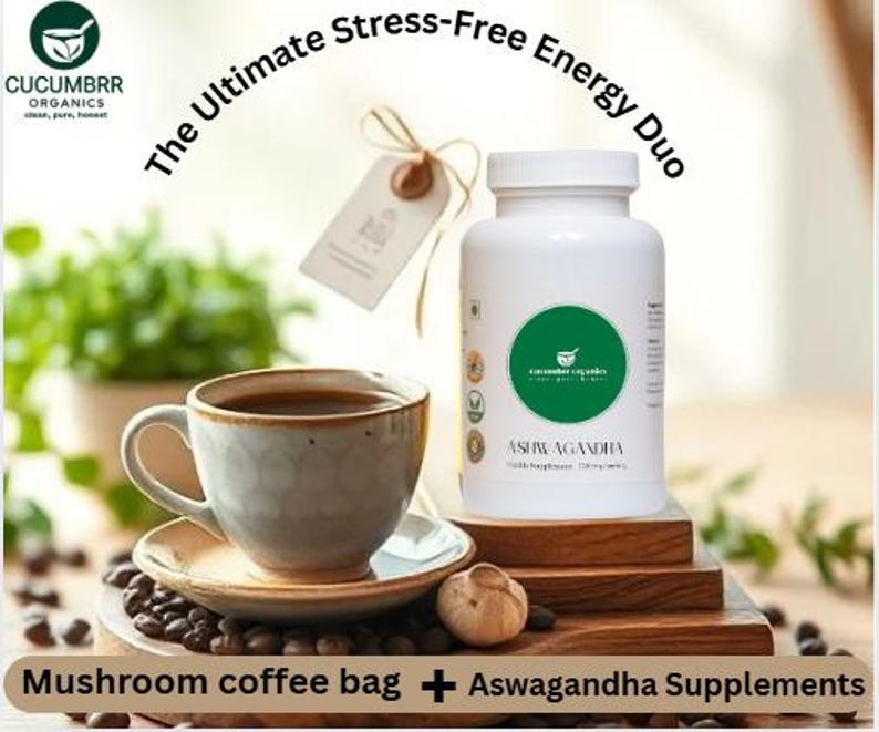 May include: A white bottle of Ashwagandha supplements next to a cup of coffee on a saucer. The image includes the text "The Ultimate Stress-Free Energy Duo" and "Mushroom coffee bag + Aswagandha Supplements".