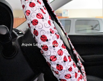 Ladybug steering wheel cover  Red ladybugs on white fabric,