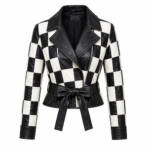 May include: A black and white chequered leather jacket featuring a notched collar, long sleeves with cuffs, and an asymmetrical front zip closure. The jacket includes a matching black leather tie belt at the waist, creating a cinched silhouette.