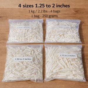 May include: Four clear plastic bags filled with white, shredded product. Each bag has a label indicating the size in inches, ranging from 3.18 to 5.08 cm. The text also states the total weight is 1 kg, with each bag containing 250 grams.