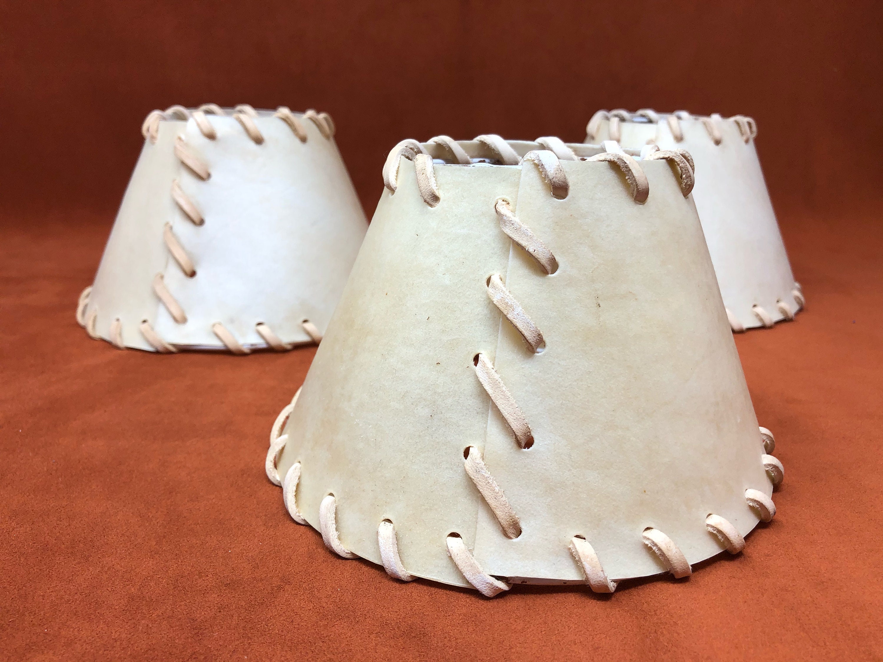 Trio Vintage Vellum and Leather Wrapped Chandelier Lampshades off