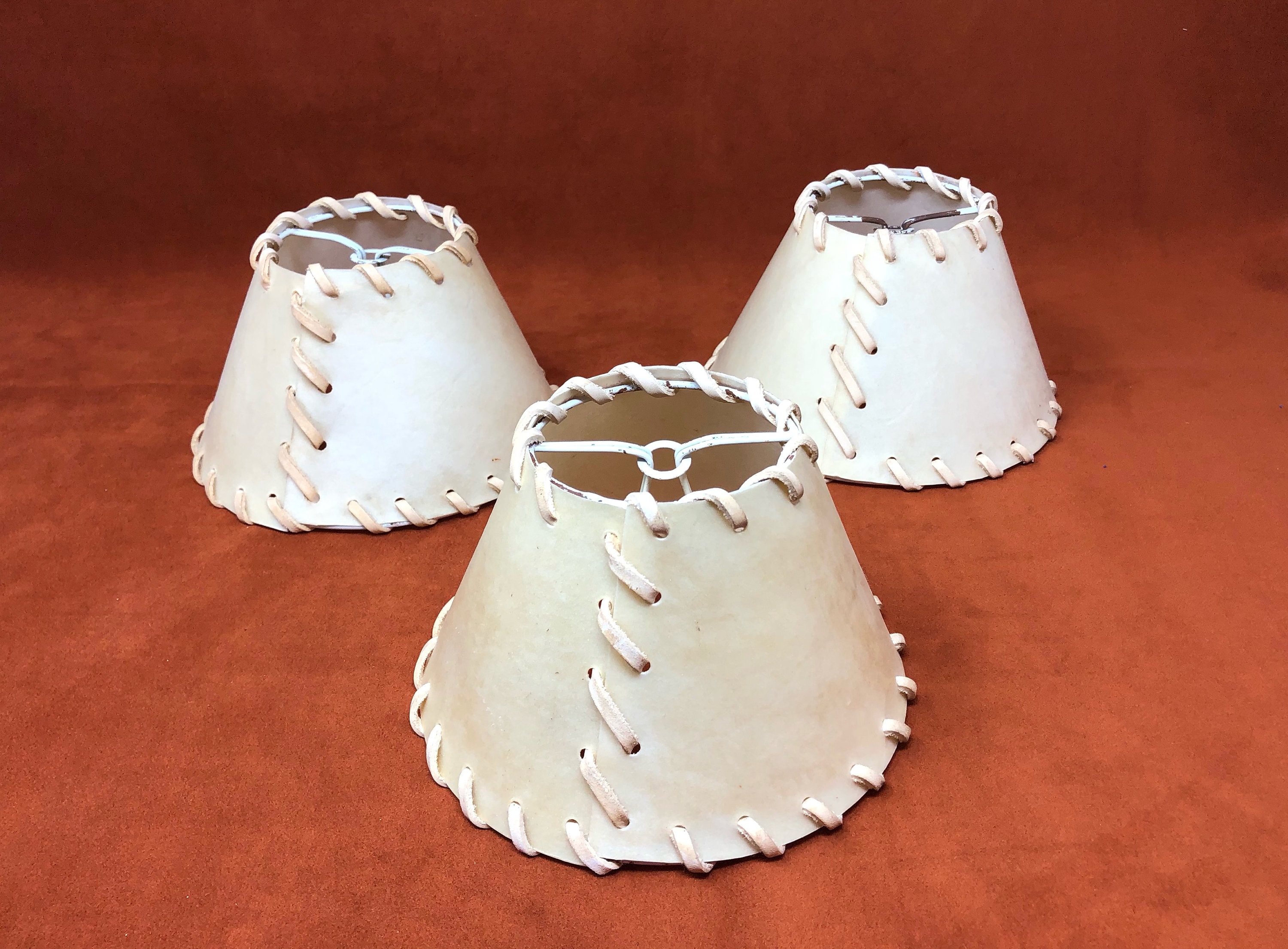 Trio Vintage Vellum and Leather Wrapped Chandelier Lampshades off