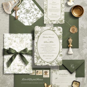 May include: A wedding stationery set featuring olive green envelopes and cream-colored paper with botanical illustrations. Includes a main invitation, details card, RSVP card, and envelopes with a gold key, tassel, wax seal, and two gold butterfly charms.