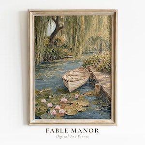 May include: A framed digital art print of a serene waterscape. A small boat is docked near a wooden pier, surrounded by lily pads and pink flowers. Overhanging willow trees frame the scene, creating a tranquil, vintage aesthetic.