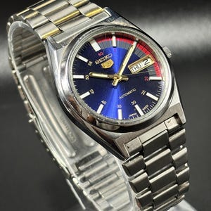 Vintage Seiko 5 Automatic Watch: Japan Made Day-Date Stainless Steel
