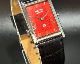 Vintage Seiko Panzeruhr: Schlanke Quarzuhr, Lederarmband, Japan Made