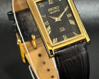 Vintage Seiko Slim Tank Quartz Watch: Golden Plated, Black Dial, Leather Strap