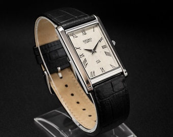 SEIKO  腕時計  1400-5180  レディース Seiko Tank Watch Women 20mm Champagne Dial Gold Tone 1400-5790 New