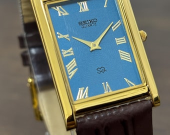 Reloj de pulsera vintage Seiko Slim Tank de cuarzo para hombre, rectangular.