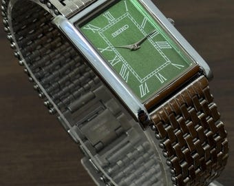 Vintage Seiko tankhorloge: slanke quartz, Romeinse wijzerplaat, roestvrij staal