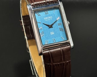 Vintage Seiko Quartz Tank Wrist Watch: Roman Numeral Dial, Leather Band
