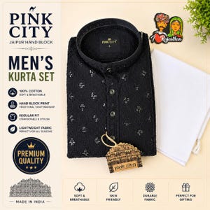 May include: Black kurta set with intricate floral embroidery. The set includes a long-sleeved shirt and white pants. The shirt features a mandarin collar and button-down front. The image also displays the text "Pink City" and "Jaipur Hand Block".