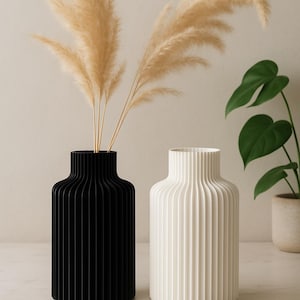 Modern 3D-printed vase in various colors