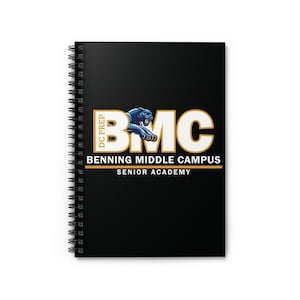 May include: Black spiral-bound notebook with the text "BMC" in white and gold, with a blue panther logo. The notebook also includes the text "DC Prep Benning Middle Campus Senior Academy" in gold.